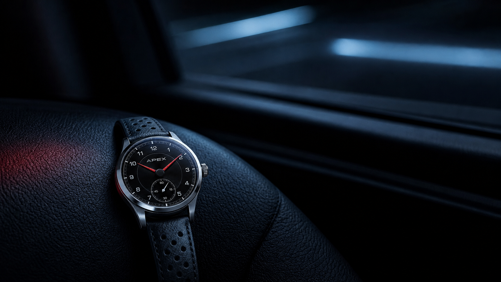 Apex watch resting on dark leather at blue hour